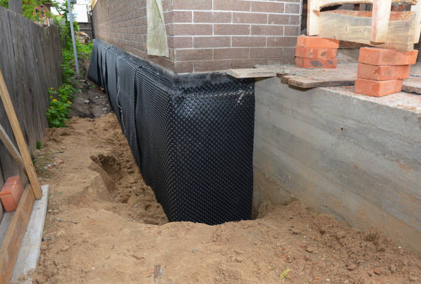 Happy homeowners after waterproofing job in Marysville